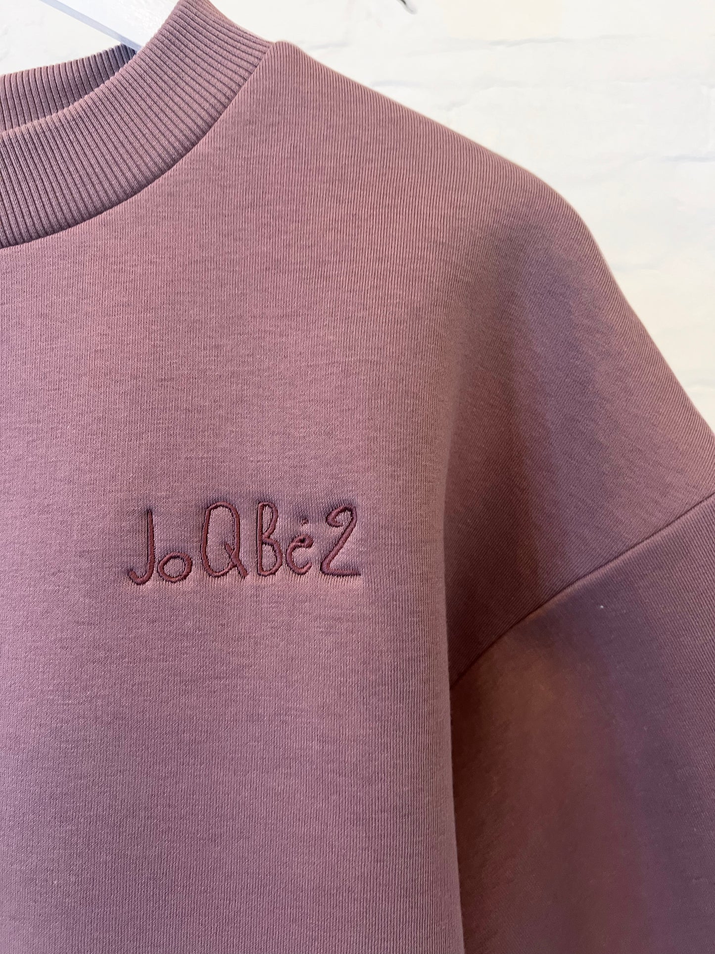 Oversized sweatshirt with 3/4 sleeves and fleece lining